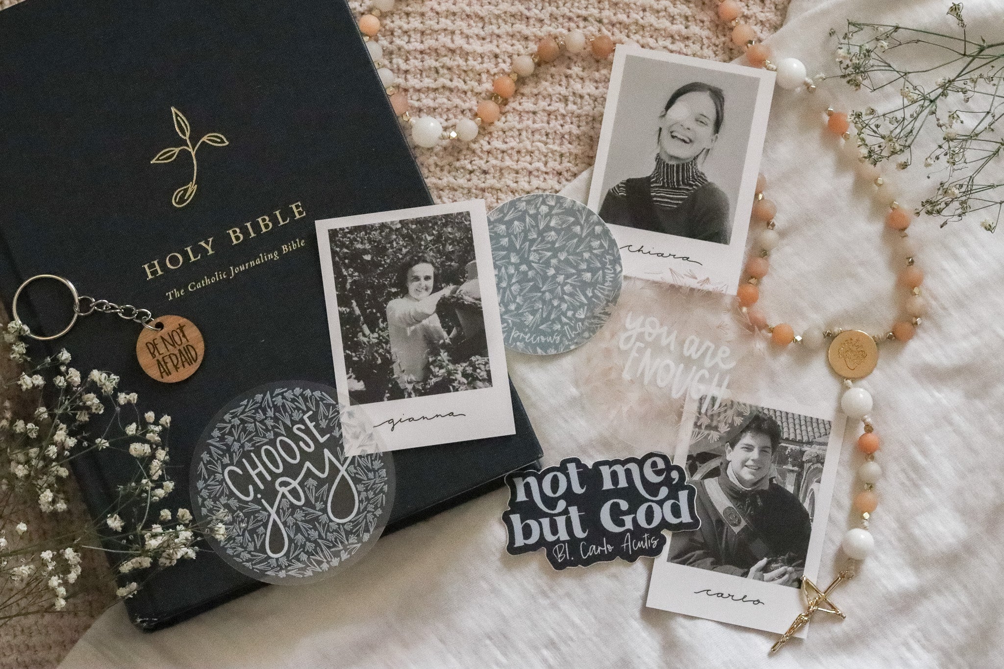 Catholic waterproof stickers for kids with Catholic saints, bible, and rosary