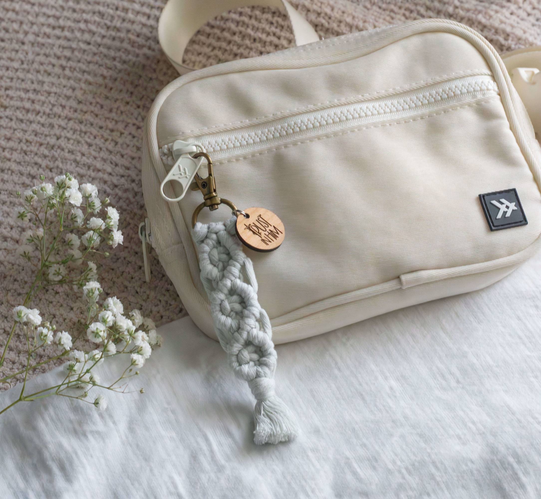 Catholic macrame keychain on bag for teens