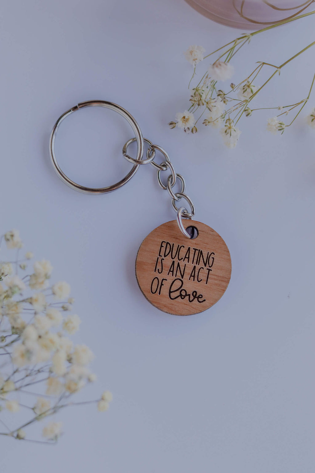 Educating is an act of love - Wood Keychain