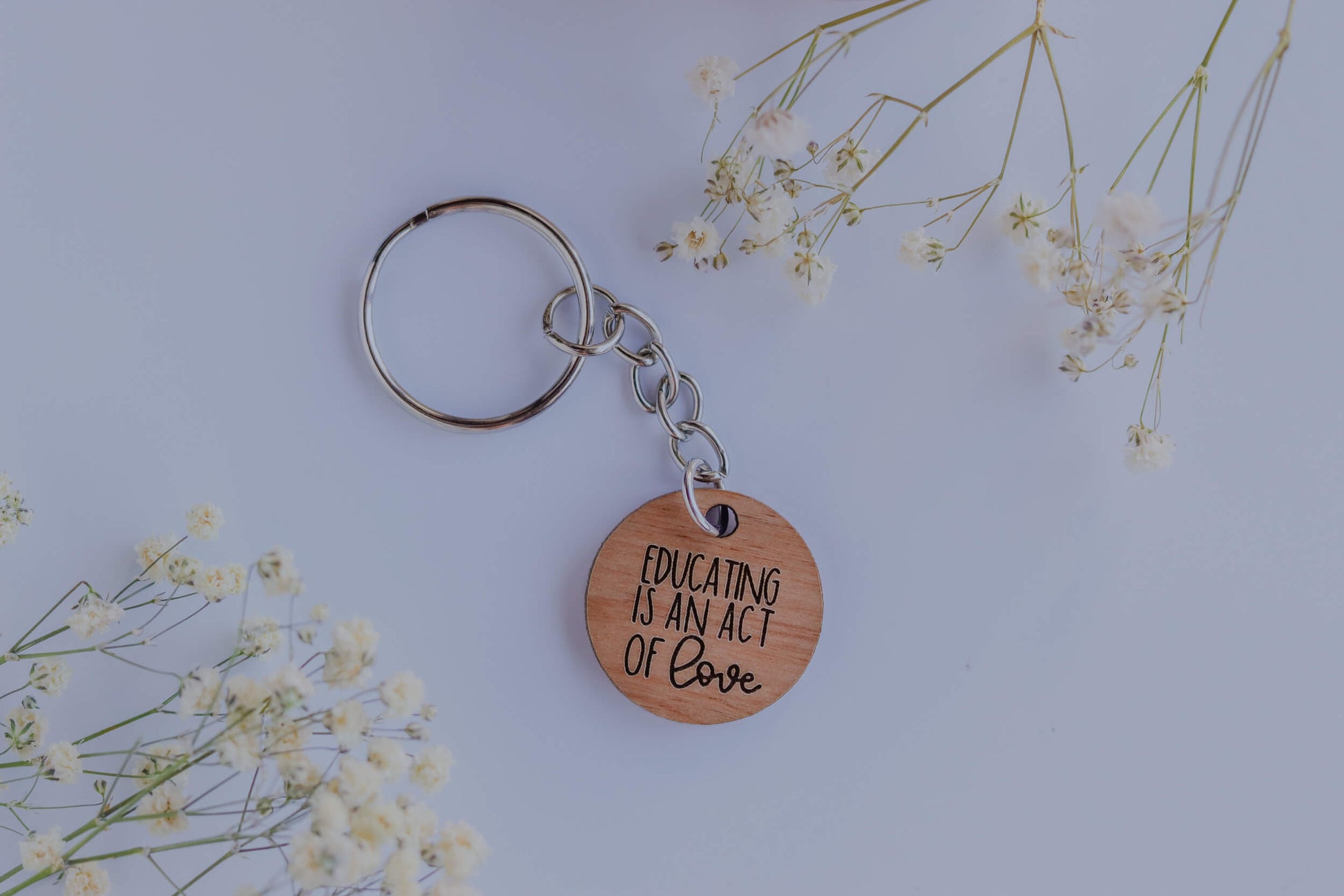 Educating is an act of love - Wood Keychain